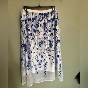 Susan Graver white chiffon skirt with blue flowers.